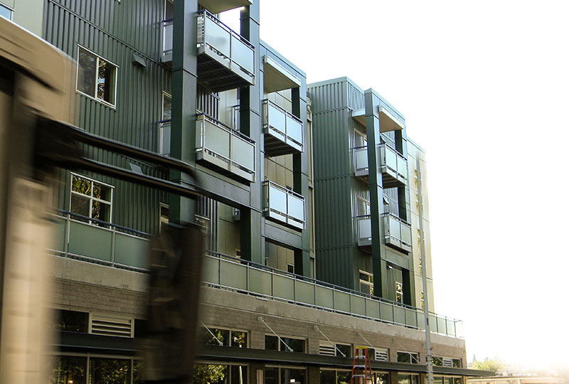 glass component railing on apartment building, Innovative Aluminium Systems
