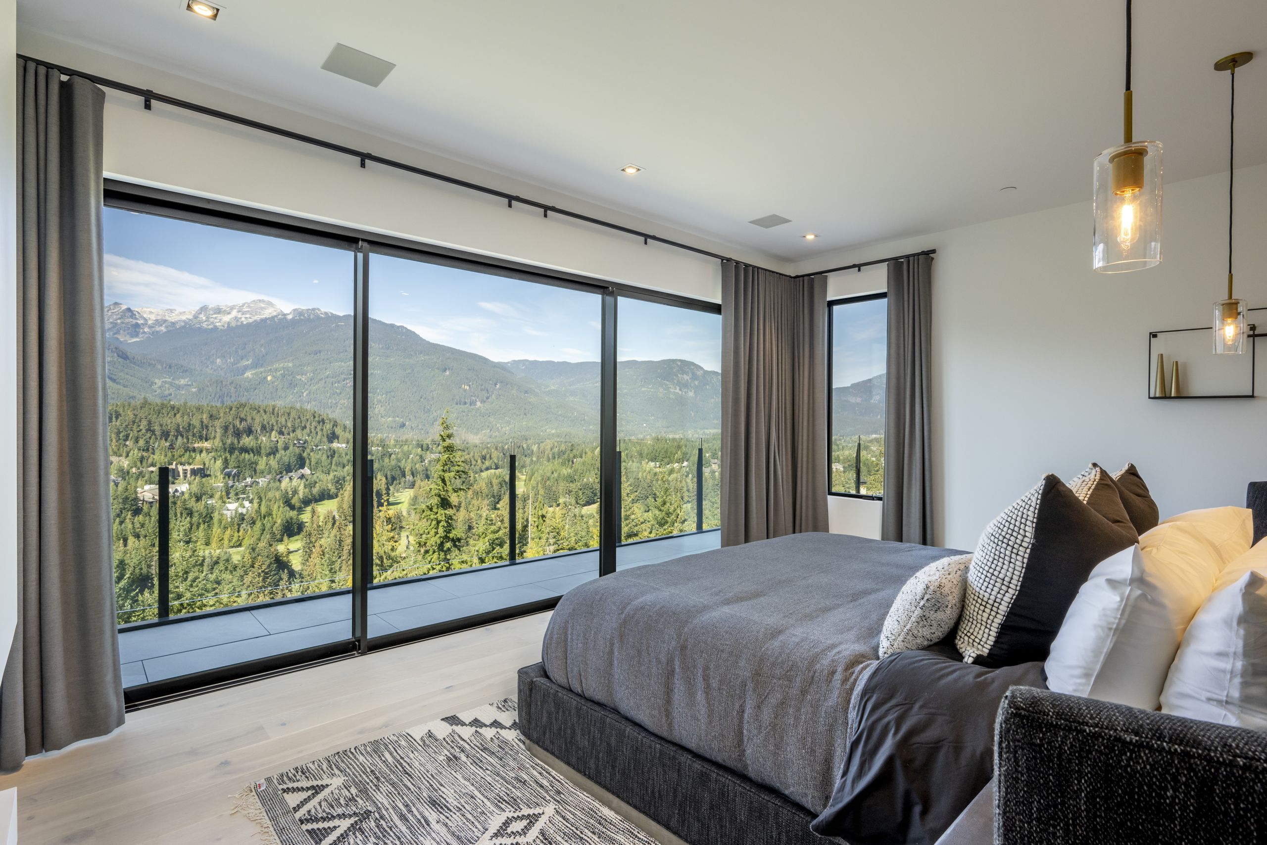 Aluminum deck railing on residential property showing different system types that affect deck railing cost