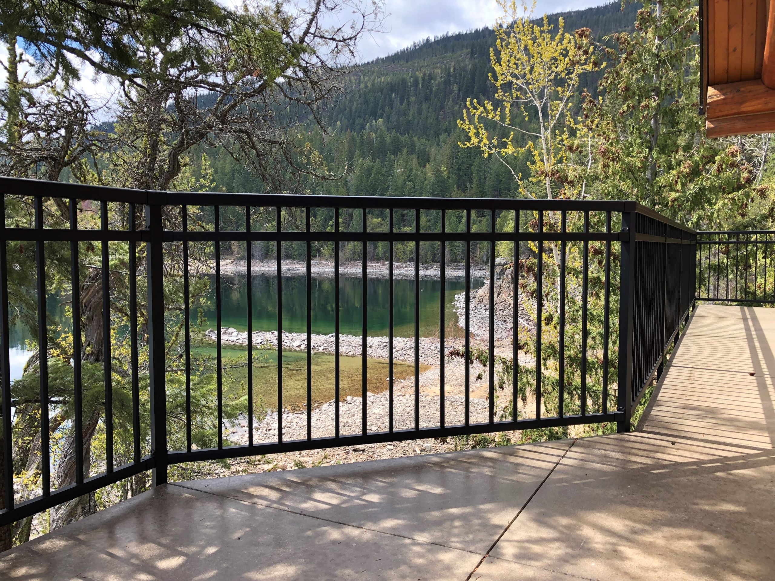 Inside Innovative Aluminum's powder coating facility in Aldergrove BC showing aluminum railing components being finished